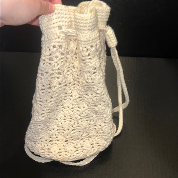 Crochet Drawstring Backpack Style Bag in Cream - Picture 1 of 7